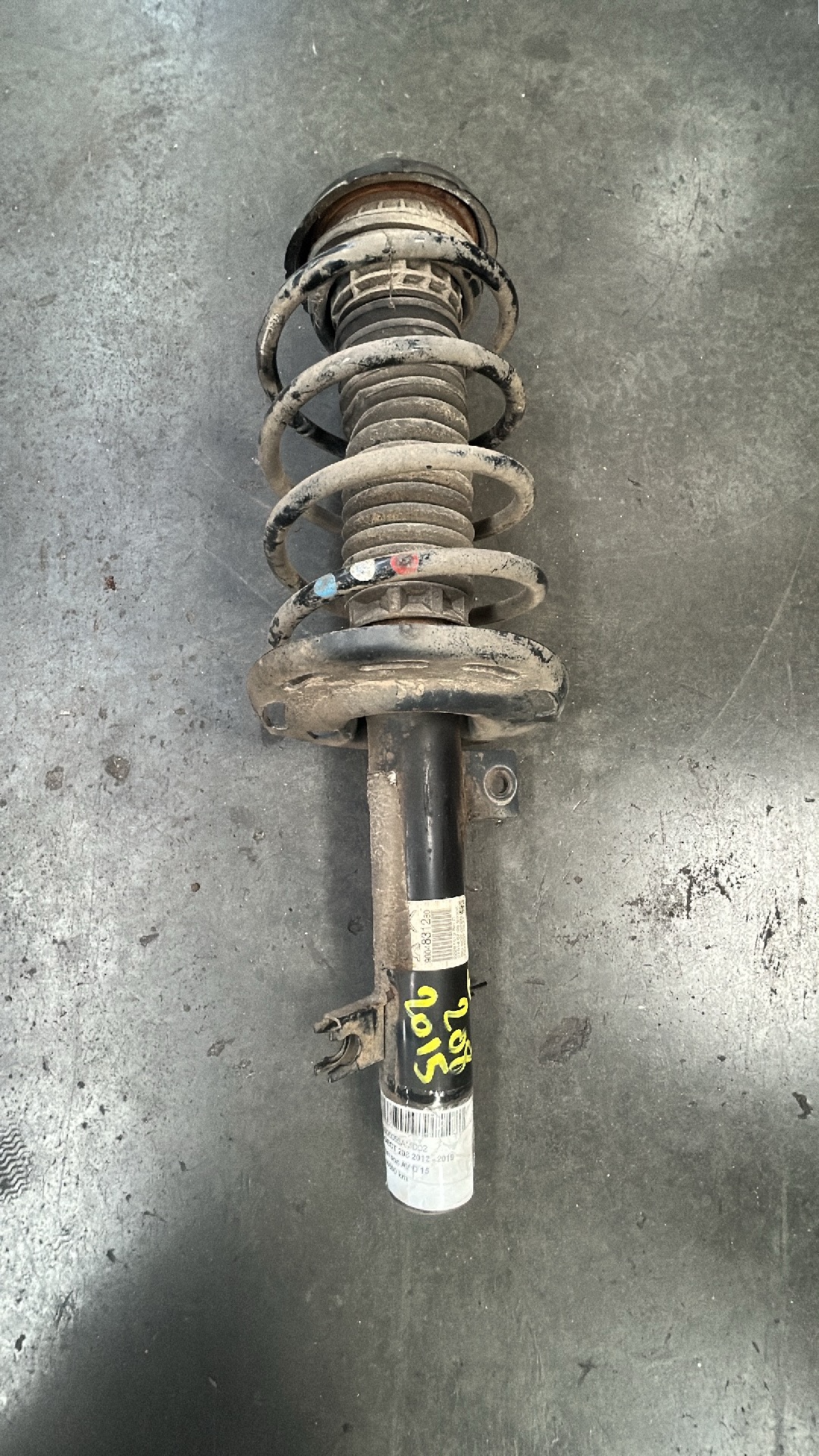 McPherson rechts voor Peugeot 208