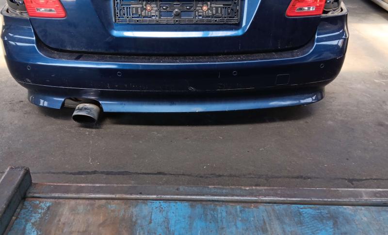 Rear bumper with sensor