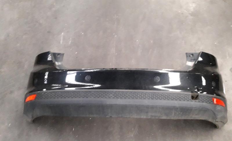 Rear bumper with sensor