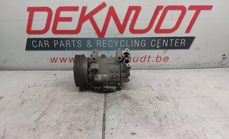 Air conditioning compressor