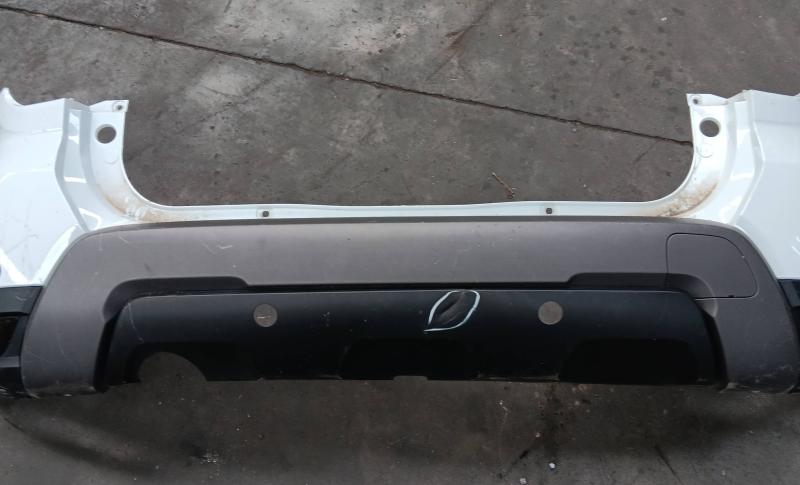 Rear bumper with sensor